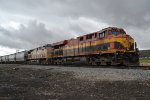 KCSM 4746, UP 6056 (ES44AC, AC4400CW) are the rear DPUs on a northbound UP (empty?) grain train at Cache Junction, Utah. April 15, 2022